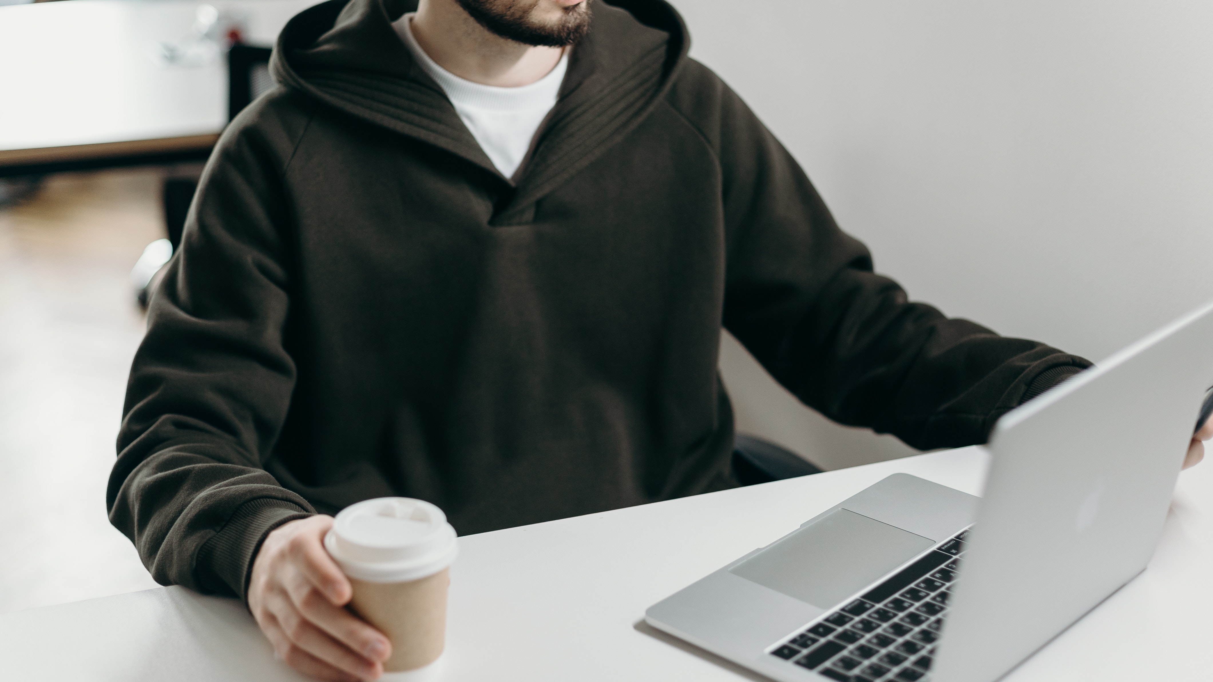 Image of a guy working from home on his laptop. Showing someone who could benefit from online therapy in Portland, Oregon. Whith support you can address blurred boundaries with an online therapist.