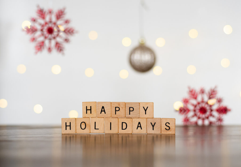 A close up of the words happy holidays on wooden blocks. Learn how an online therapist in Oregon can help couples during the holiday season. Search for stress management in San Diego, CA to get in contact with a San Diego anxiety therapist.