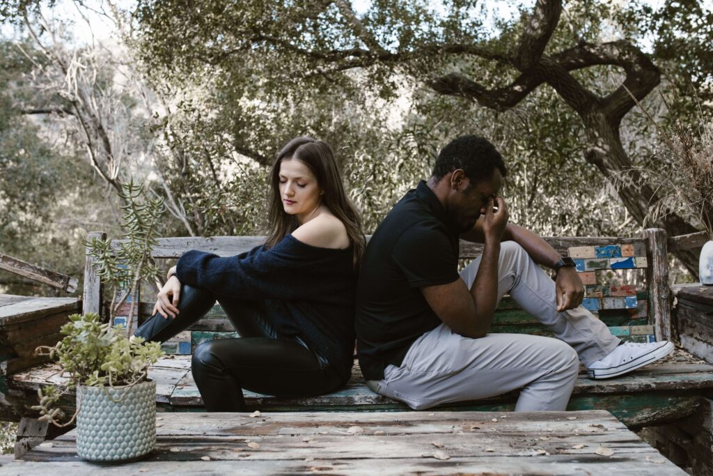 Couple in disagreement, representing emotional reactivity and unresolved patterns explored in trauma-informed couples therapy in San Diego, CA.