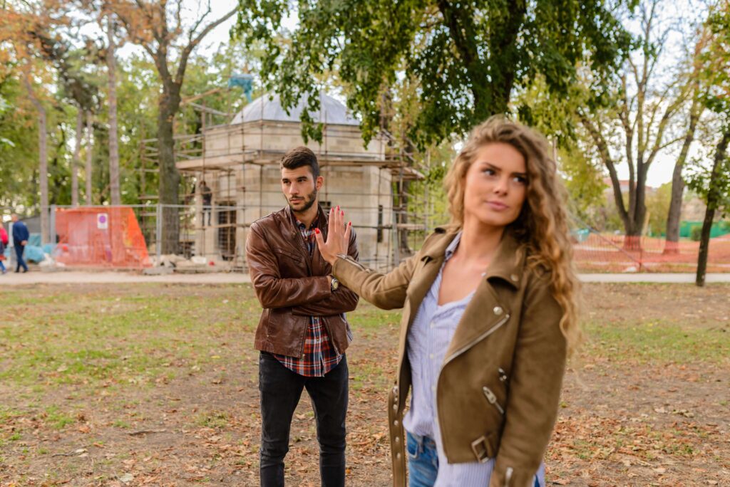 Person giving their partner the silent treatment, representing communication difficulties and relationship conflict addressed through relationship counseling in San Diego, CA.